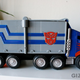 Illustration for article titled Optimus Prime Voice-Changing Helmet and Battle Blaster Review
